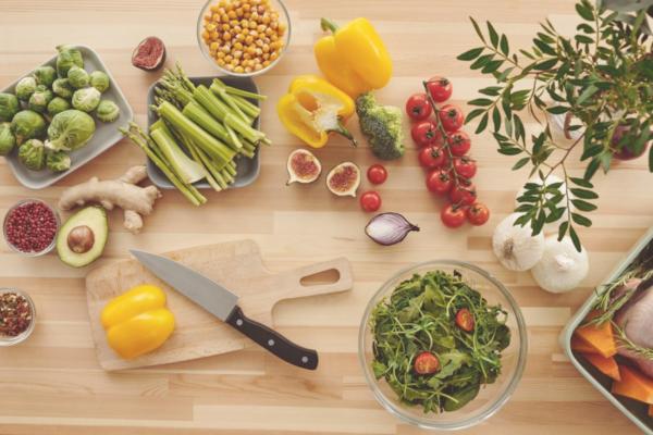 Beautifully plated vegetarian dish featuring roasted vegetables and fresh herbs